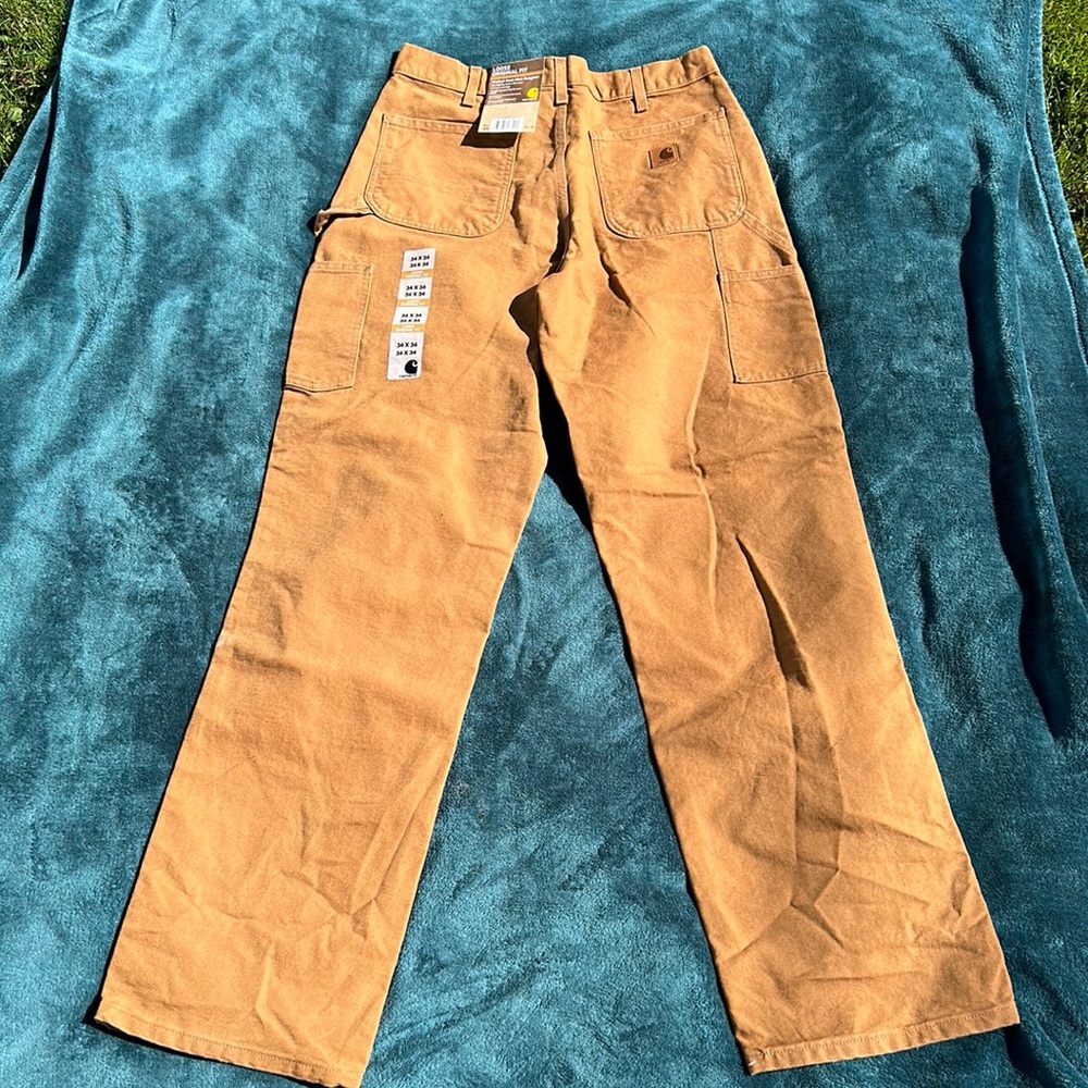 Carhartt B11 BRN 34X34 New With Tags.  Green Marker On One Leg